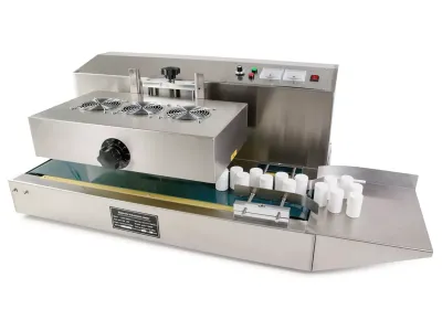 SIC-2000AX  SELLADORA POR INDUCCIÓN MAGNETICA AUTOMÁTICA CONTINUA DE MESA CON CABEZA AJUSTABLE  20-130MM