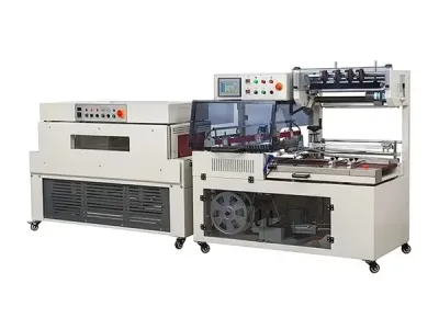 LINEA DE EMPAQUETADO AUTOMÁTICO DE TERMOENCOGIDO: EMPACADORA EN L DQL-5545SG Y TÚNEL DE ALTA EFICIENCIA DSC-4525L