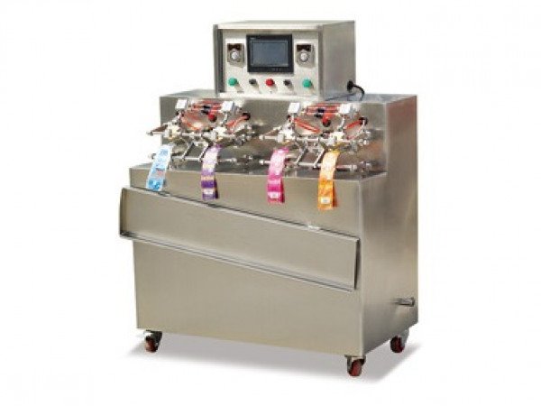 LSBF-4 LLENADORA SELLADORA SEMIAUTOMÁTICA CON 4 CABEZAS DE BOLSAS FLEXIBLES & BOLIS